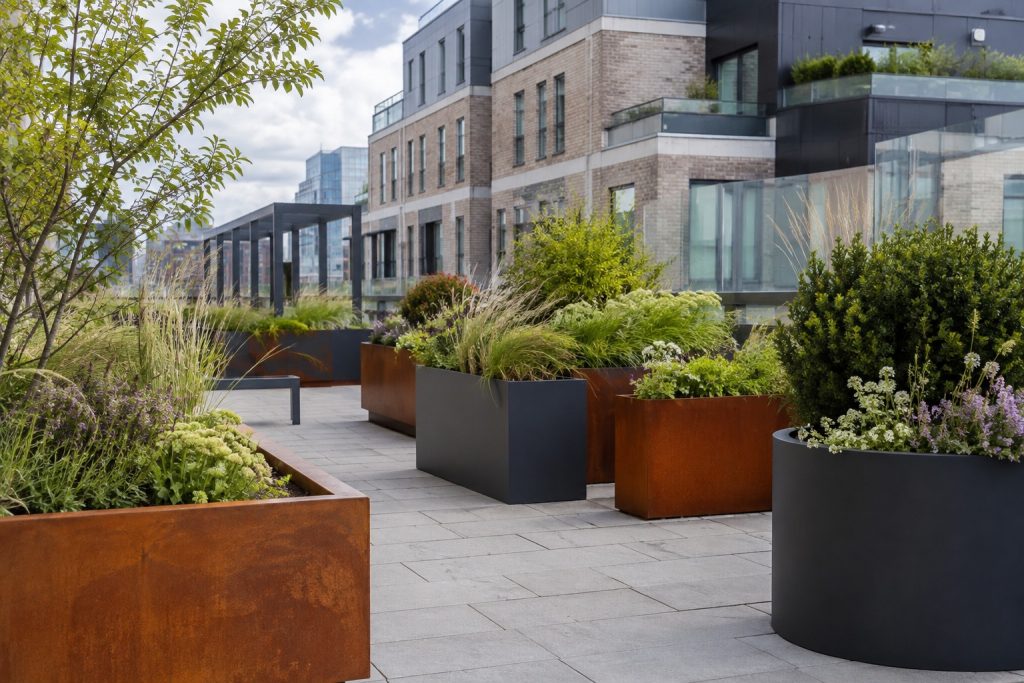Urban greening on a budget: how steel planters are reshaping city spaces Steel planters used for urban greening in a modern city space